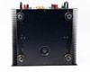 Sonance SONAMP 1250 MKII bottom view showing chassis base with four rubber isolation feet and partial view of rear speaker binding posts