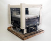Veeco OSP Overhead Scanning Profiler – three-quarter rear-right view showing gantry frame, scan stage, wiring, and lower electronics enclosure on pallet