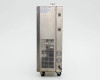 Lneya Sundi-125 left side view showing condenser/refrigeration mesh grill in lower section, two analog pressure gauges on right-side panel, and fluid connection port at top, unit on casters