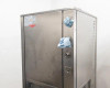 Lneya Sundi-225-2TN chiller – left side view showing fluid inlet/outlet port fittings with rags present and CE compliance label