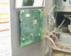EnerSys ES3-24-850B control PCB mounted on interior door panel with multi-pin harness connectors