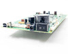 Zebra 404720-001P P110i board — edge view highlighting power switch, DC barrel jack, USB port, and large electrolytic capacitor