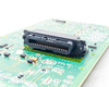 Zebra 404720-001P P110i board — close-up of multi-pin printhead/ribbon connector on PCB underside