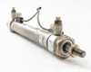 SMC CDM2B25-125 double-acting pneumatic cylinder – full unit angled view showing rod end, auto switch, and push-in fittings