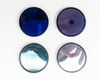 CVI Laser LPFS-IR-2.00 – four 2-inch infrared filters laid flat showing coating colors and visible surface scratches and coating damage