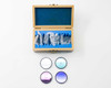 CVI Laser LPFS-IR-2.00 infrared long pass filter set – four 2-inch filters removed from wooden case displayed below open box