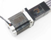 Exlar KM60 stepper motor mount view showing rust on motor face and motor-to-actuator interface bracket