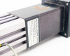 Exlar KM60-0150-05-NF-ISC-N34-L2 product label showing model number, serial number, roller screw lead 5mm, Rev A