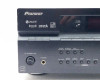 Pioneer VSX-917V-K upper front panel close-up showing Neural Surround, XM, Sirius logos, Phase Control knob, and display with RUN readout