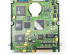 IBM 99F7832 PCB close-up showing WDC, Zilog Z80C180, AMD, and Texas Instruments controller chips on green circuit board
