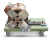 Leeson N256T17DB1C electric motor on wheeled cart, front-on view of four-blade fan, motor housing showing rust and weathering