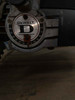 DeWalt logo and degree scale dial on radial arm saw motor head – miter angle indicator