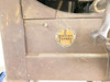 Walker-Turner Machine Tools nameplate badge close-up on cast iron saw body