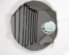 Close-up interior view through tube bore showing heating element wire loops against gray ceramic refractory chamber with center pass-through aperture