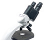 Carl Zeiss microscope binocular head close-up with staff notation reading NO DEFECT MISSING PARTS and CPL W eyepieces