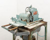 Pistorius Model C Water Cooled Radial Saw, three-quarter view showing blade guard and work table with rust on stand