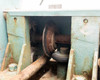 Pistorius Model C internal drive mechanism showing drive belt, pulleys, and heavy rust on components