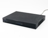 Araknis AN-310-SW-R-8-POE 310 Series managed gigabit switch — front-left angled view showing Araknis Networks and OvrC branding with LED indicators illuminated