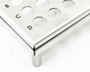 Close-up of CMI stainless steel test tube rack corner — CMI logo etched on frame, rows C and D visible with corner leg detail