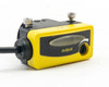 Banner QS30D sensor emitter face and side view showing red infrared LED lens, mounting studs, and output indicator symbols
