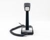 Shure Brothers XTBM694EF microphone front view showing chrome-accent base and coiled RJ cable at left