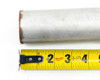 KF40 bellows hose – end-on view of hose opening showing inner bore diameter approximately 1.5 inches, stamped markings visible on hose end body