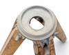 Close-up of cast metal tripod head mount showing 3 1/2-8 THD threaded opening stamped on the rim