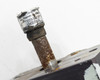 LC-1-06A coupler close-up on output shaft showing label with part number 13475-7003B and significant surface rust and corrosion