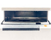 Solidex 828 VHS rewinder – close-up interior view of tape cradle and drive spindles with lid open