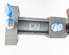 Sheffer 2HHRHF3 hydraulic cylinder horizontal view showing full barrel length, Sheffer Corporation logo label, and blue port caps at both ends