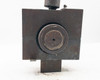 Steel base fixture attached to Sheffer 2HHRHF3 cylinder — front face showing circular recessed bore opening with heavy wear and surface oxidation