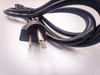 NEMA 6-20P plug close-up showing two flat blades and ground pin configuration