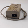Compaq Series 2692 AC Adapter rear view showing IEC C14 three-prong AC inlet and Compaq logo with attached output cable