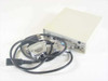 Percon Series 20 20-000-00 barcode decoder front view with two interface cables and power cord laid out