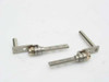 Multimedia 665 LCD hinge pair — angled view showing hinge pivot pin, spring coil, and flat mounting arms