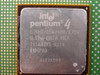 Intel Pentium 4 SL57W close-up of IHS label showing 1.7GHz/256/400/1.75V markings and Costa Rica origin