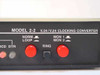 E|Comms Inc Model 2-2 front panel label detail – MODEL 2-2 V.24/V.24 CLOCKING CONVERTER with control button labels