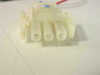 Close-up of multi-pin Molex-style connector housing on one of the DC cooling fans