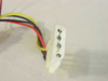 Close-up of a 4-pin Molex connector on a 12V cooling fan with red, black, and yellow wires