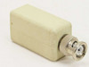 Fibronics FM040-RJM-7 RJ11 to BNC adapter – rear view showing BNC male connector and off-white plastic housing
