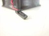 Close-up of 2-pin black connector on DC brushless fan wire lead