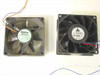 Close-up of two DC brushless cooling fans side by side — Nidec Beta SL (left) and Delta Electronics FFB0912EHE (right)
