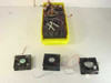 Mixed lot of 12V 15V 16V DC brushless CPU and case cooling fans in yellow storage bin with three fans displayed in front