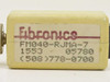 Fibronics FM040-RJMA-7 – top label view showing FM040-RJMA-7 model number, date code 1553 05780, and Fibronics branding