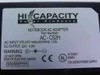 Hi Capacity AC-C52H Notebook AC Adapter label showing 20V 4.5A 90W specs and UL CE markings