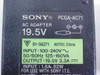 Sony PCGA-AC71 AC adapter label showing 19.5V output, 3.3A, 100-240V input, ASTEC manufacturer, made in China