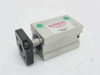 Compact Air Products GC234X12 Pneumatic Guided Block Cylinder – front and side view showing aluminum body, black front mounting plate with four bolt holes, center rod, and green port plugs on top