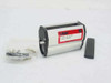 Linak LS 22-50 linear actuator housing front view with label, mounting hardware bag, and rubber end cap beside unit