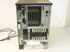 TIE Communications ONYX IV PBX interior with card cage fully loaded – multiple yellow-labeled cards installed with power supply section visible at right