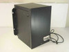 TIE Communications DTS Systems ONYX IV PBX cabinet – left side and rear view showing black enclosure with ONYX badge and power cord